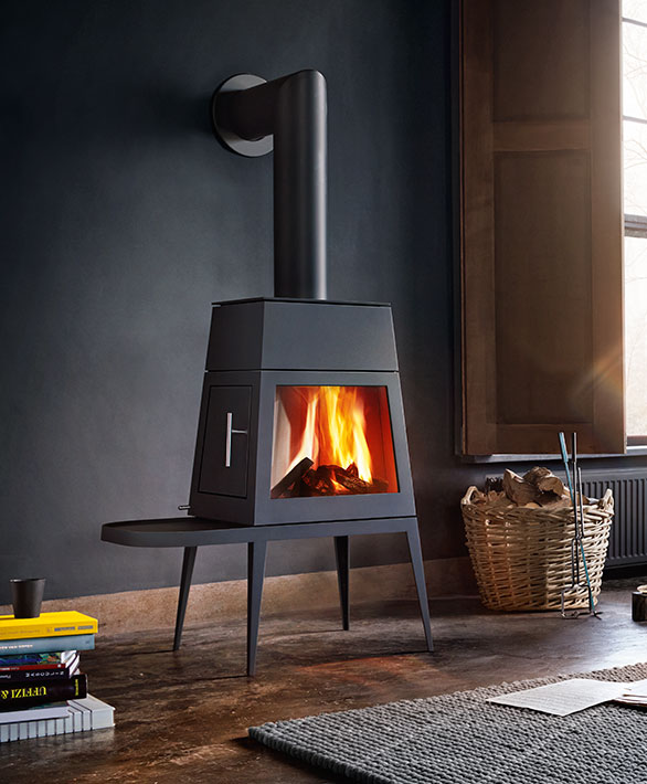 Skantherm Shaker small wood heater in an elegant space.